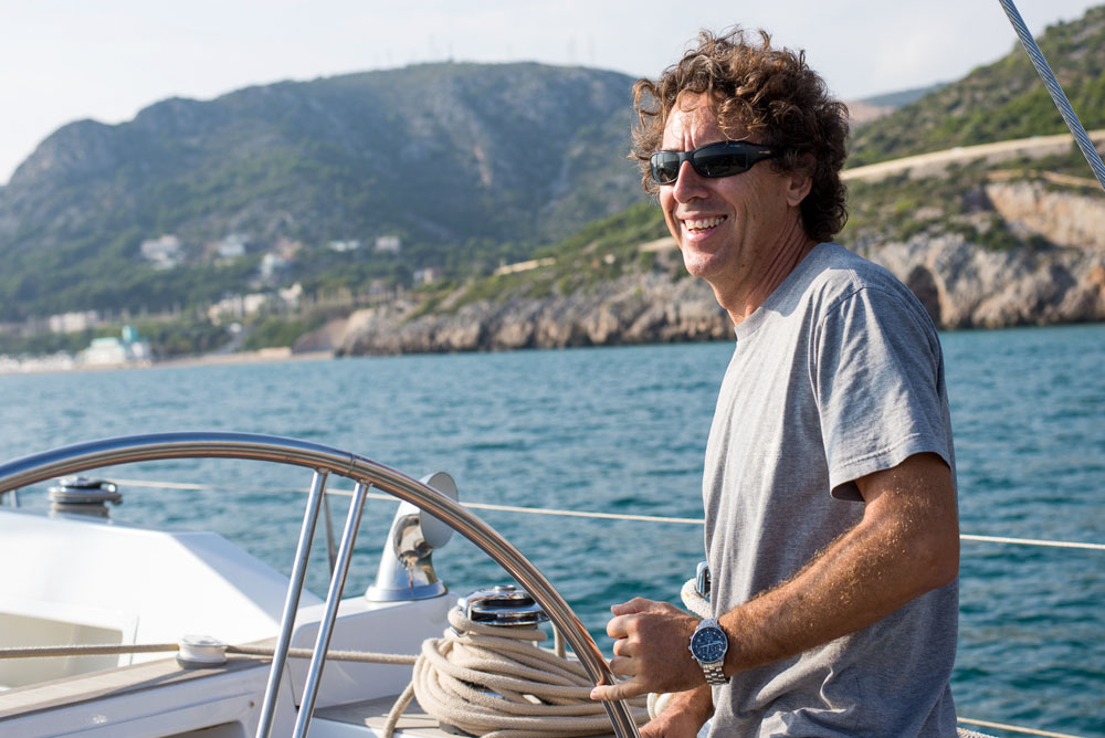 Alberto, a Nautal boat owner on his boat in Garraf, sailing Garraf