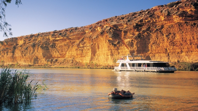 Motorboat travelling down river in Australia, Murray River sailing route