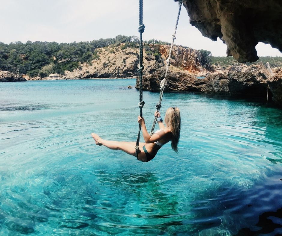 Girl in a secret cove in Europe