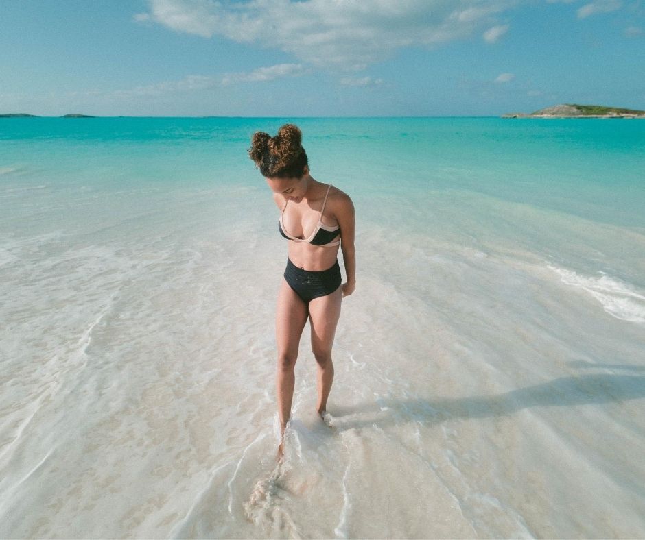 Girl in the clear waters of Bahamas