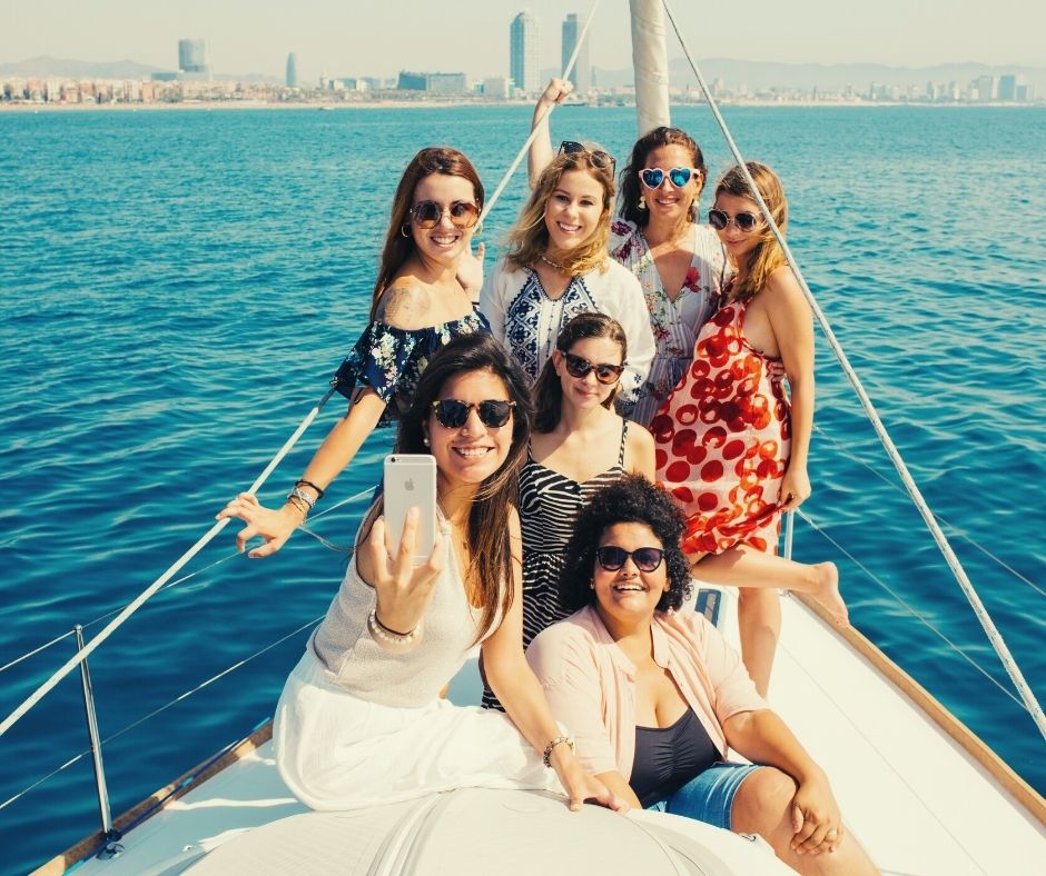 Friends travelling together, enjoying sailing