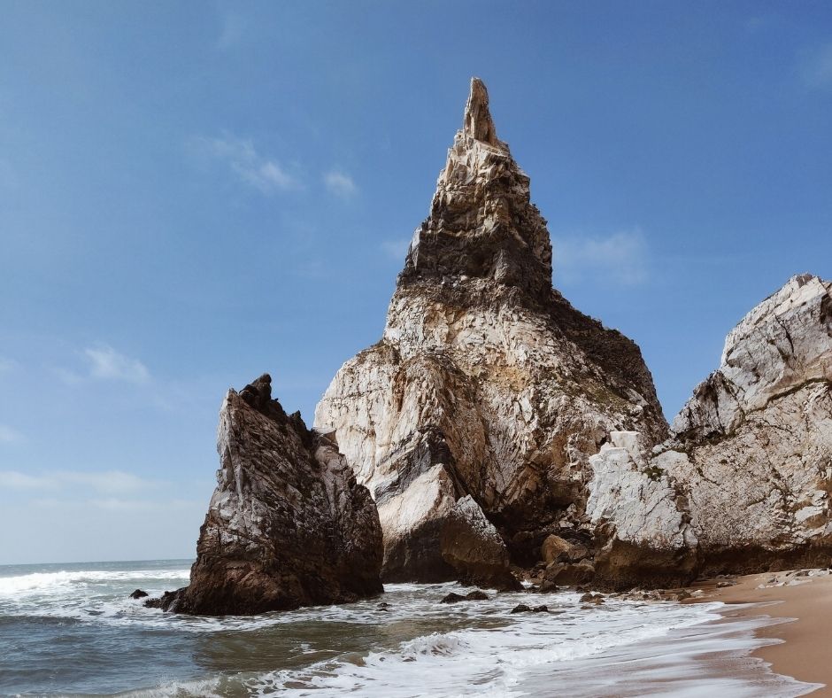 Praia da Rocha beach with the cliffs and waves