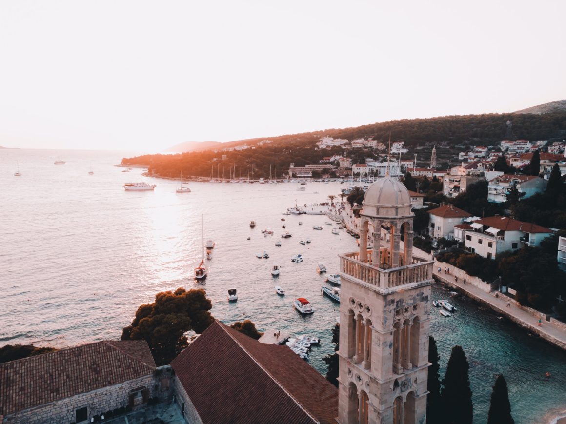 church, view of hvar town, hvar church, boats in hvar bay, sunset, blue water, small bay,