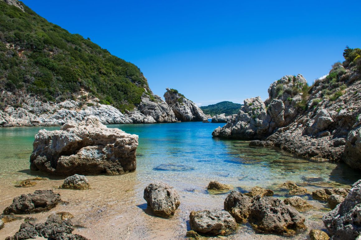 Agios Georgios beach and clear waters off of Corfu coast