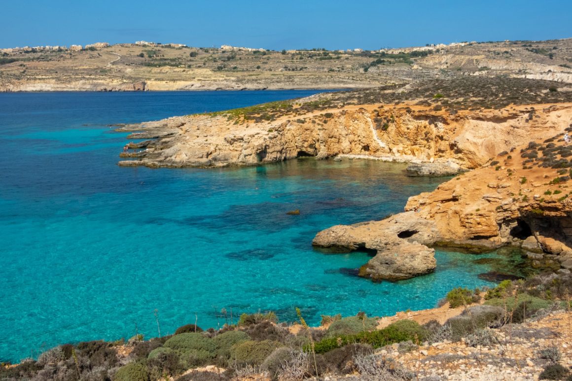 The Blue Lagoon, a particularly popular beach on the island of Comino, Malta.