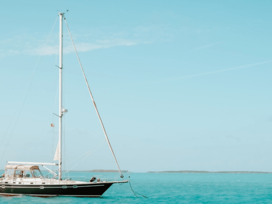 Sailboat anchored in turquoise sea